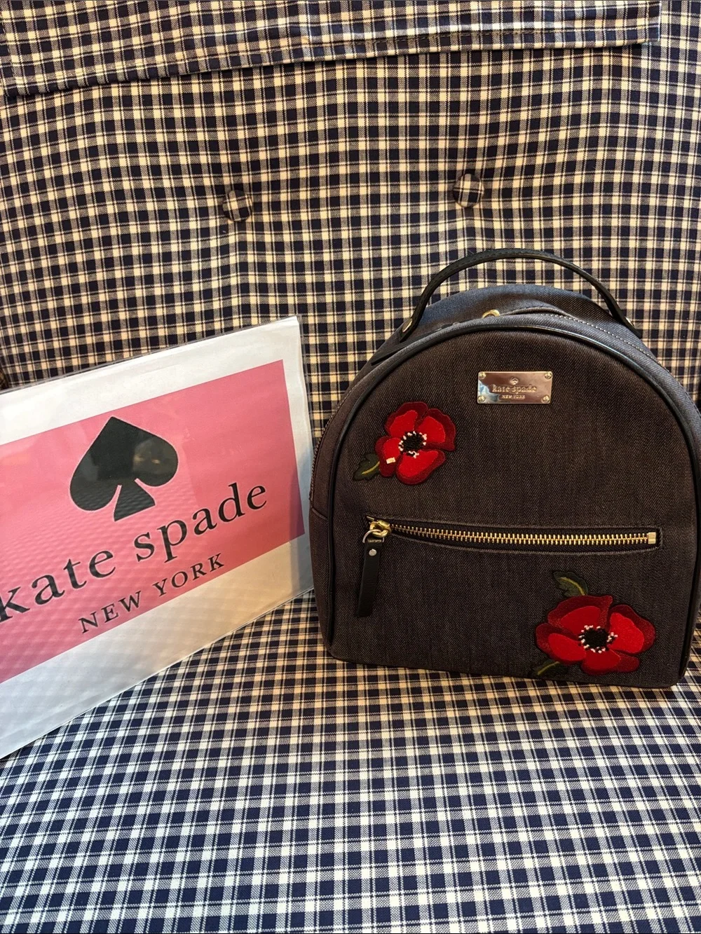 kate spade Grove Street Poppy Dark Denim Mini Backpack with Red Floral Appliqués